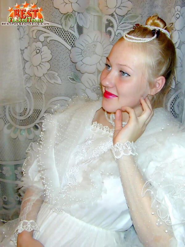 Young looking girl with red lips dons mothers wedding dress for dildo action page 1