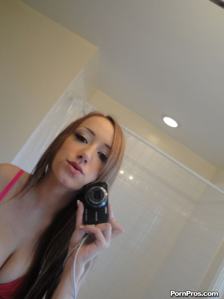 Young solo girl Victoria Rae Black takes mirror selfies of her naked breasts page 1