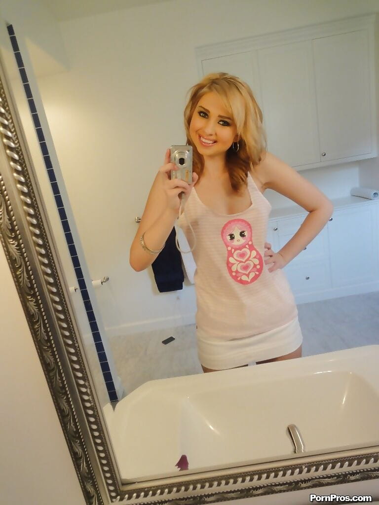 Blonde babe Molly Bennett does sexy self-shots in the bathroom page 1