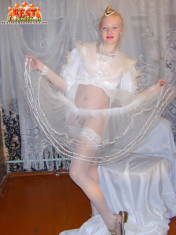 Young looking girl with red lips dons mothers wedding dress for dildo action page 1