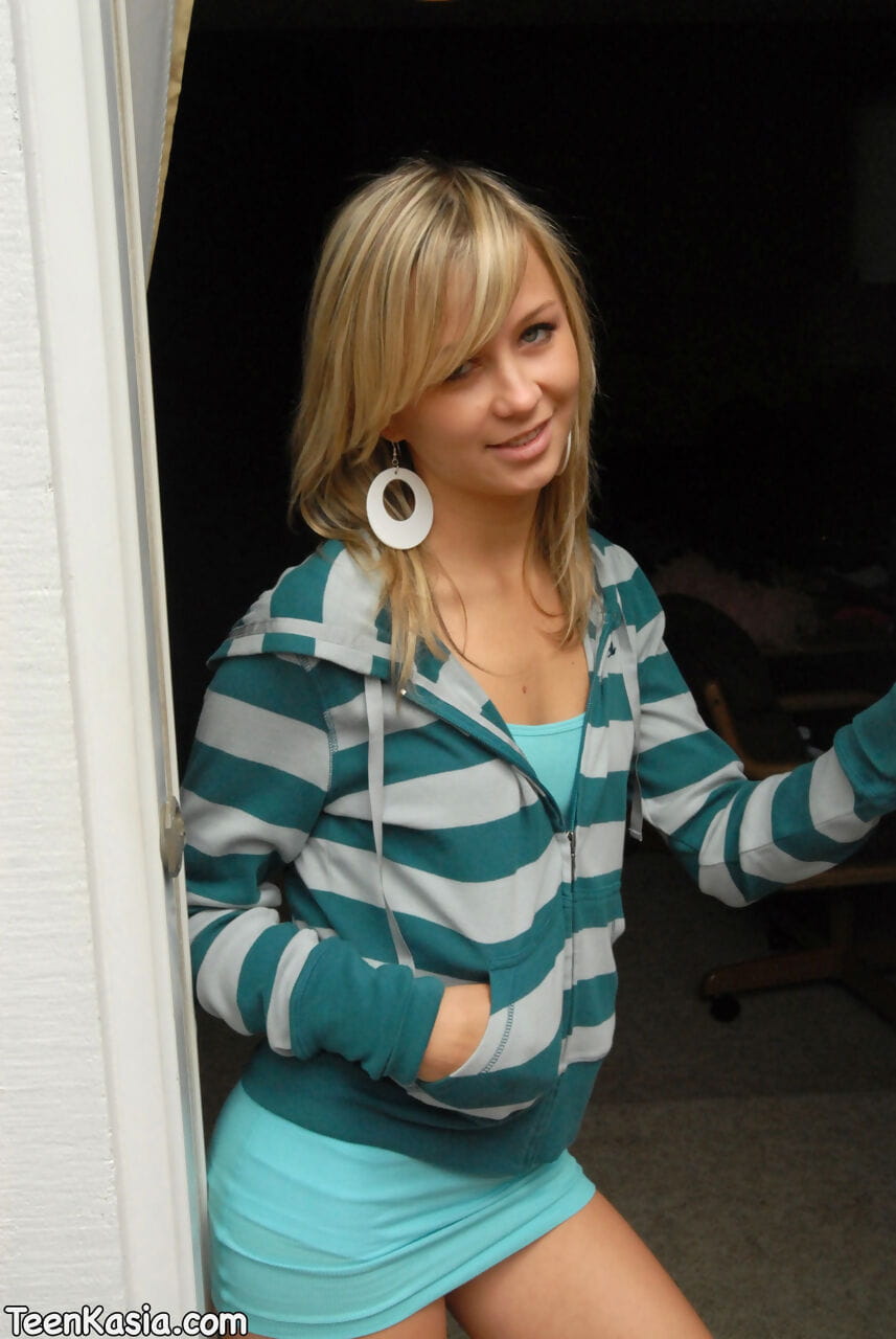 Young blonde prances on back stairs and patio in white socks and underwear page 1