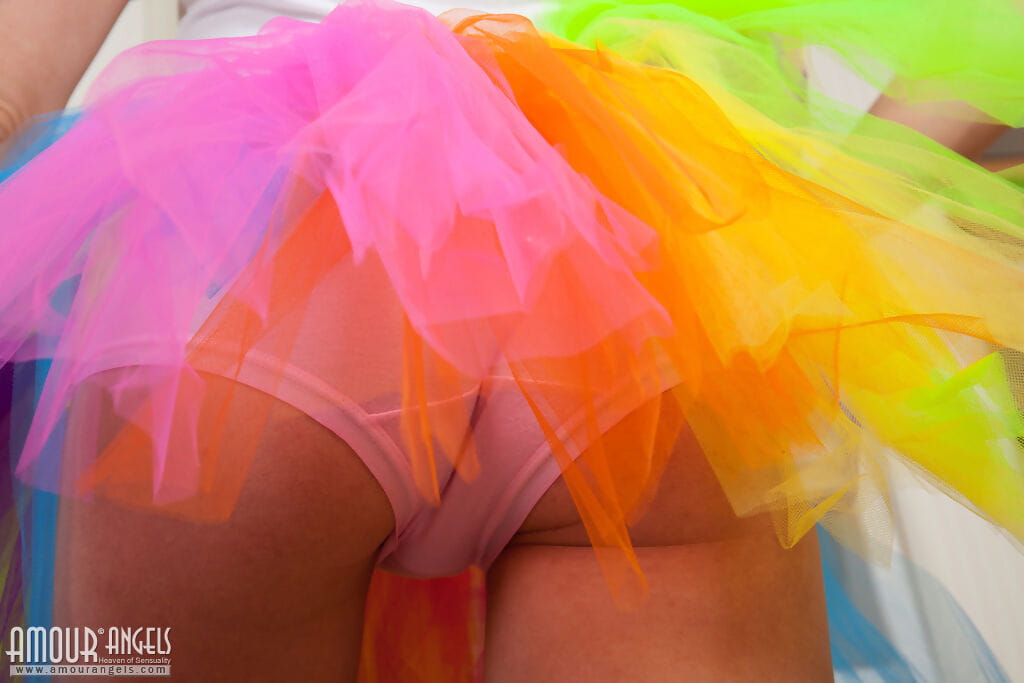 Young first timer Raisa ditches her rainbow tutu to pose nude page 1