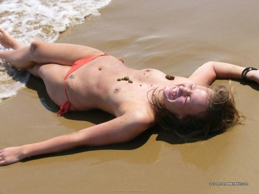 Blonde teen gf having fun topless at the beach - part 3554 page 1