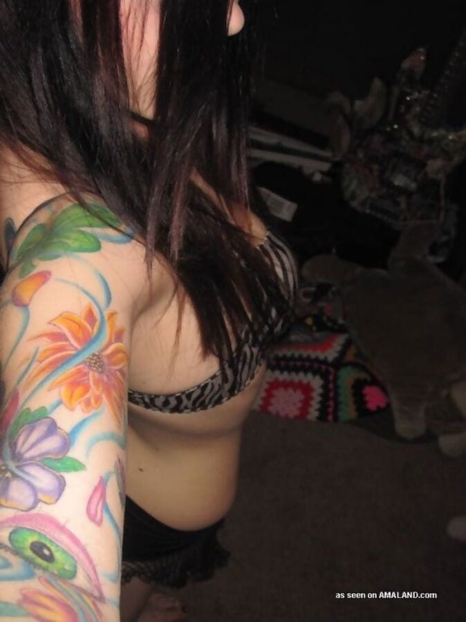Inked rocker chick spreading and showing her shaved twat - part 2545 page 1