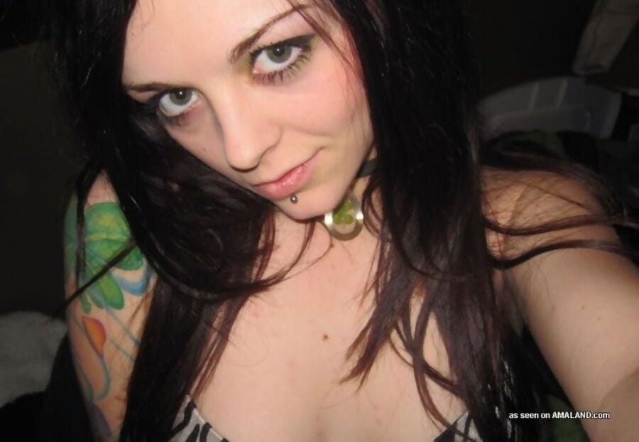 Inked rocker chick spreading and showing her shaved twat - part 2545 page 1